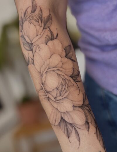 Black and grey peony tattoo porto outer forearm
