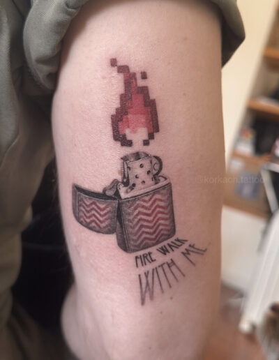 Realistic lighter tattoo with pixel flame on arm, small fine line object tattoo Porto